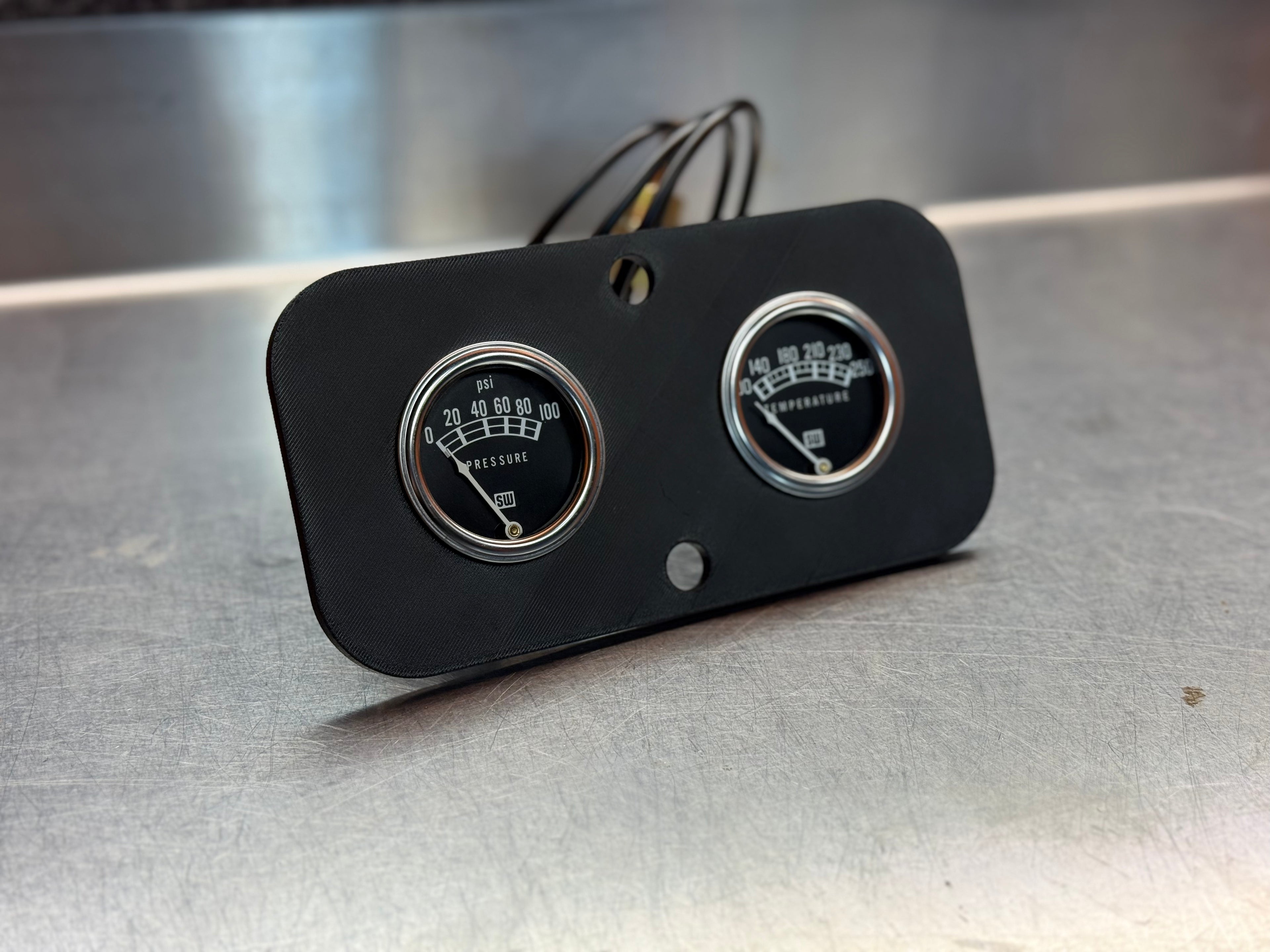 Black dual carbon fiber gauge panel